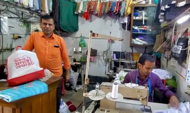নওগাঁসহ বিভিন্ন উপজেলায় ঈদকে সামনে রেখে কাপড় সেলাইয়ে ব্যস্ত সময় পার করছে দর্জিরা