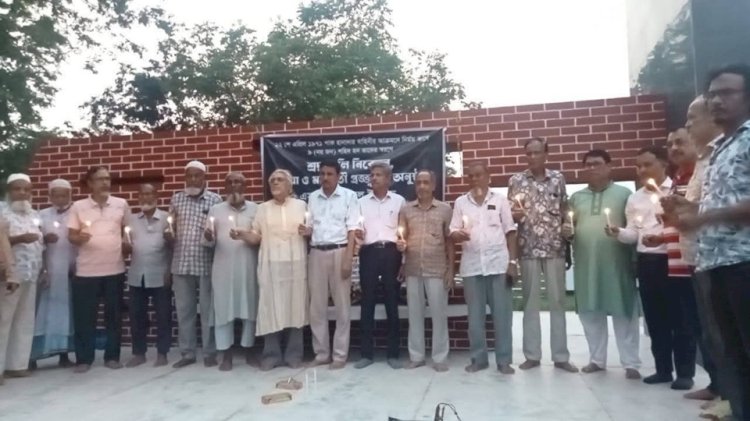 নওগাঁর ধামকুড়ি বধ্যভূমি চত্বরে গণহত্যার শহিদদের প্রতি শ্রদ্ধাঞ্জলি ও মোমবাতি প্রজ্জ্বলন